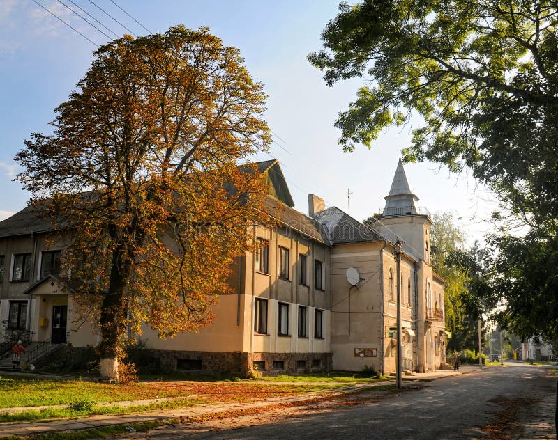 Historical town hall in Bilshivtsi, Ivano-Frankivsk region, Ukraine at sunny autumn morning