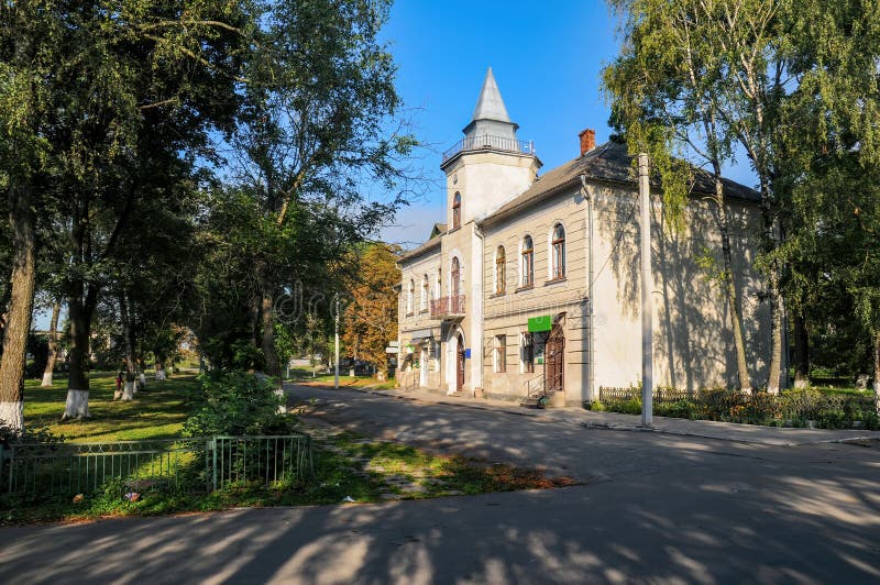 Historical town hall in Bilshivtsi, Ivano-Frankivsk region, Ukraine at sunny summer morning