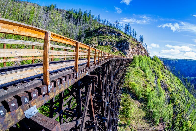 Originally one of 19 wooden railway trestle bridges built in the early 1900s in Myra Canyon, Kelowna, BC, it is now a public park with biking and hiking trails. Originally one of 19 wooden railway trestle bridges built in the early 1900s in Myra Canyon, Kelowna, BC, it is now a public park with biking and hiking trails.