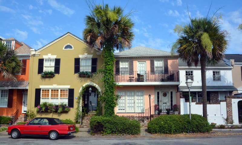 CHARLESTON SOUTH CAROLINA USA JUNE 27 2016: Historic houses along Battery st excellent example of 18th-century Georgian townhouse construction in Charleston, South Carolina. CHARLESTON SOUTH CAROLINA USA JUNE 27 2016: Historic houses along Battery st excellent example of 18th-century Georgian townhouse construction in Charleston, South Carolina