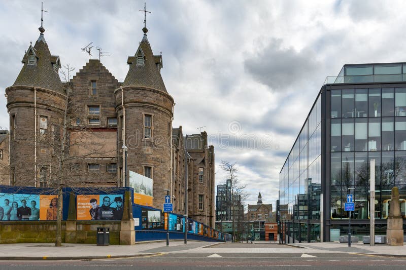 Edinburgh, Scotland - April 2018: Historic Scottish Baronial style buildings of the former Royal Infirmary of Edinburgh that was used as Old Surgical Hospital, now being restored by Quartermile Development for University of Edinburgh, Scotland, UK. Edinburgh, Scotland - April 2018: Historic Scottish Baronial style buildings of the former Royal Infirmary of Edinburgh that was used as Old Surgical Hospital, now being restored by Quartermile Development for University of Edinburgh, Scotland, UK