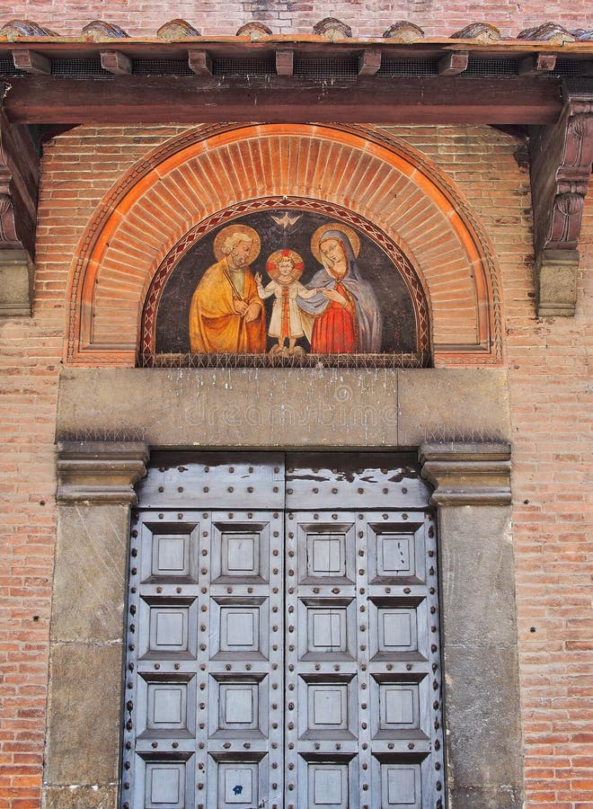 Historische Siena Building With Religious Icon, Italien stockbild Historische Siena Building With Religious Icon, Italien stockbild