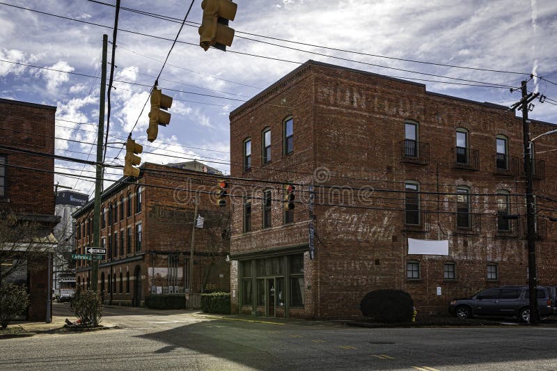 Montgomery, Alabama, USA-February 7, 2023: Historic brick buildings on North Court Street in downtown Montgomery most of which were built circa 1900-1915. Montgomery, Alabama, USA-February 7, 2023: Historic brick buildings on North Court Street in downtown Montgomery most of which were built circa 1900-1915