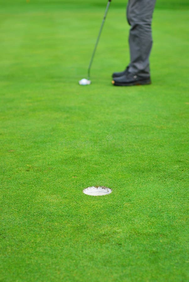 Hit a golf ball legs stock image. Image of golf, foot 38493493