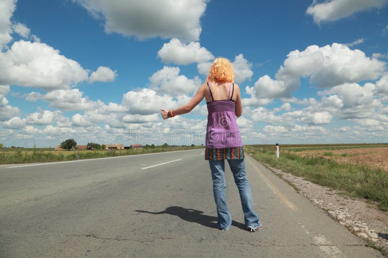 Teen girl hitch hiking stock image. Image of woman, hitchhiking 33350395