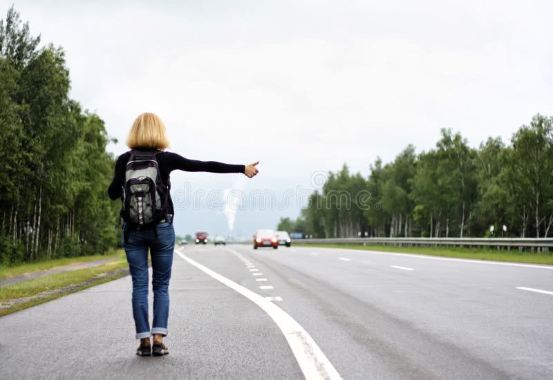 HITCH HIKING stock image. Image of active, hitchhiking 33521281