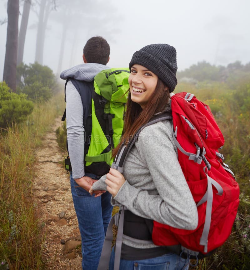 Hitting the Trail. Portrait of a Beautiful Young Woman Hiking Along a ...