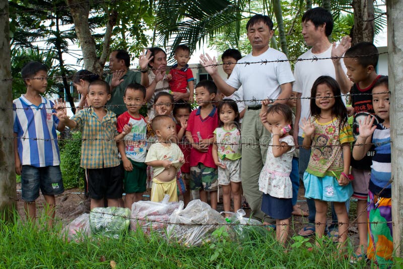 Nong Khai, Thailand - August 14: since 1001 days are 158 hmong refugees from Laos in this ID Camp and they can only leave ther cells for 2 hours a day, August 14 2009 in Nong Khai, Thailand. Nong Khai, Thailand - August 14: since 1001 days are 158 hmong refugees from Laos in this ID Camp and they can only leave ther cells for 2 hours a day, August 14 2009 in Nong Khai, Thailand