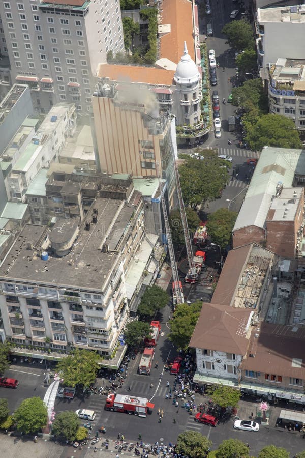 Firefighters at fire on high rise building in Ho Chi Minh City Vietnam stock photography Firefighters at fire on high rise building in Ho Chi Minh City Vietnam stock photography