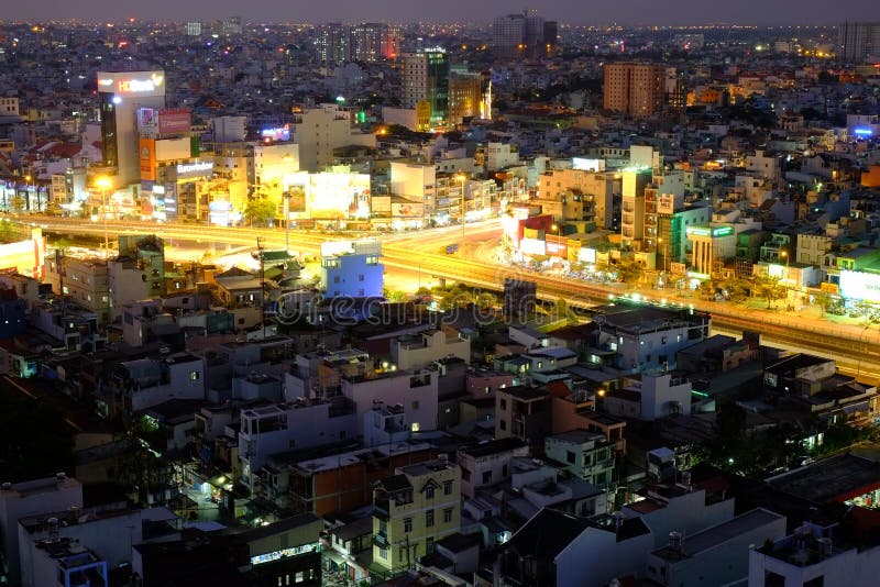 Ho Chi Minh city, Vietnam - 13 March 2014: Hang Xanh intersection flyover in twilight stock photography Ho Chi Minh city, Vietnam - 13 March 2014: Hang Xanh intersection flyover in twilight stock photography