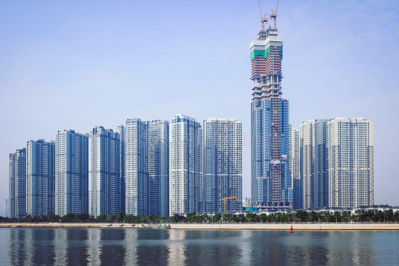 HO CHI MINH/VIETNAM, EL 29 DE OCTUBRE DE 2017 - ALTOS EDIFICIOS EN UN NUEVO PROYECTO DEL CENTRAL PARK EN SAIGON, HO CHI MINH CITY foto de archivo HO CHI MINH/VIETNAM, EL 29 DE OCTUBRE DE 2017 - ALTOS EDIFICIOS EN UN NUEVO PROYECTO DEL CENTRAL PARK EN SAIGON, HO CHI MINH CITY foto de archivo