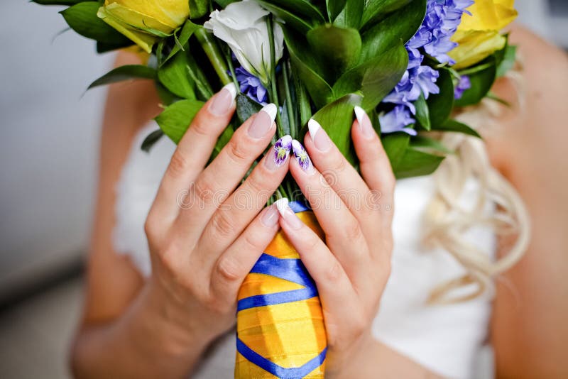 Wedding bouquet of roses manicure and yellow and blue 1. Wedding bouquet of roses manicure and yellow and blue 1