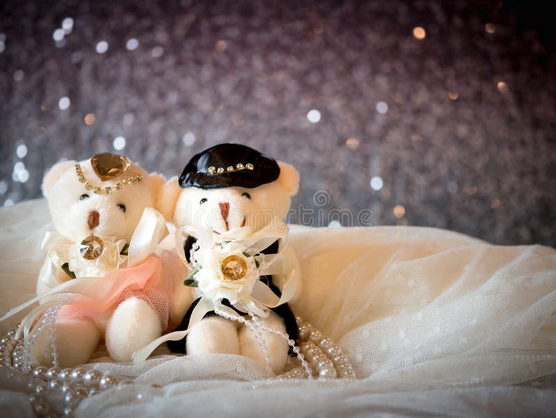 Wedding concept : Couple Teddy Bears in wedding dress . Creative valentine greeting card. Wedding concept : Couple Teddy Bears in wedding dress . Creative valentine greeting card.