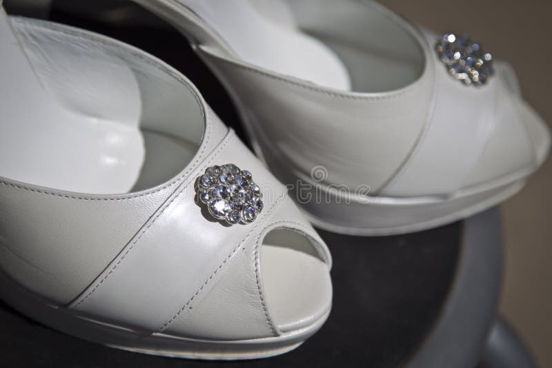 White wedding sandals in detail. White wedding sandals in detail