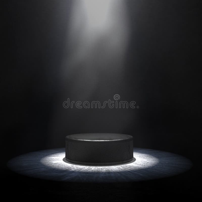 Hockey Background. A Hockey Puck on an Ice Surface in a Dark Space with Light Smoke or Fog Illuminated by a Spotlight.