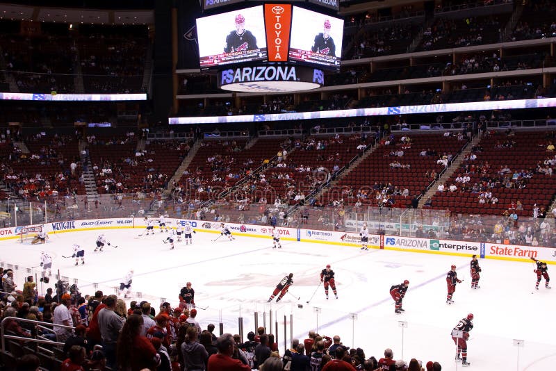 Hockey NHL - de Oliebusjes van Edmonton & de Coyotes van Phoenix royalty-vrije stock afbeeldingen Hockey NHL - de Oliebusjes van Edmonton & de Coyotes van Phoenix royalty-vrije stock afbeeldingen