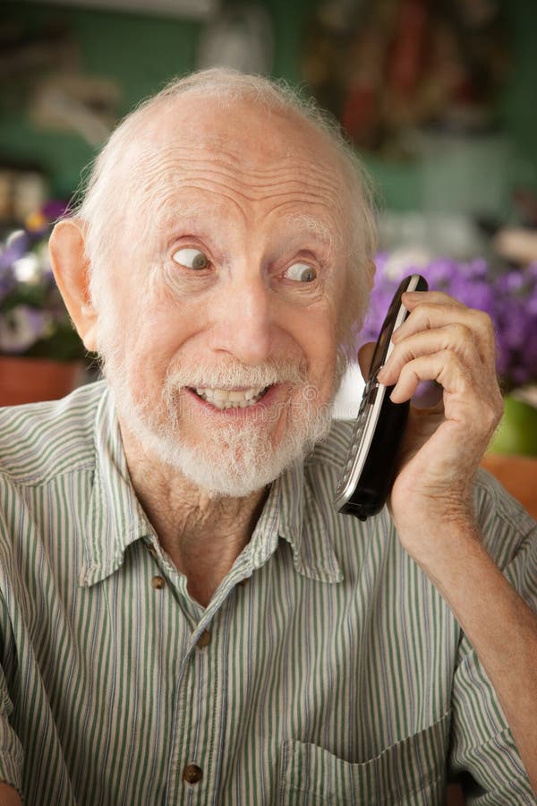 Senior man at home on the telephone. Senior man at home on the telephone