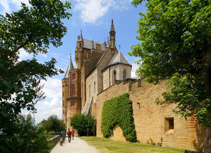 Hohenzollern Castle is approximately 50 kilometers (31 miles) south of Stuttgart, Germany. It is considered the ancestral seat of the Hohenzollern family, which emerged in the Middle Ages and eventually became German Emperors. The castle was first constructed in the early 11th century and completely destroyed after a 10-month siege in 1423 by the imperial cities of Swabia. A second, larger and more sturdy castle was constructed from 1454 to 1461, and served as a refuge for the Catholic Swabian Hohenzollerns during wartime; including during the Thirty Years' War. By the end of the 18th century, however, the castle gradually fell into disrepair, leading to the demolition of several dilapidated buildings. Today, only the chapel (photo) remains from the medieval castle. The third version of the castle, which stands today, was constructed for King Frederick William IV of Prussia between 1846 and 1867. The design is based on English Gothic Revival architecture and the castles of the Loire Valley. Hohenzollern Castle is approximately 50 kilometers (31 miles) south of Stuttgart, Germany. It is considered the ancestral seat of the Hohenzollern family, which emerged in the Middle Ages and eventually became German Emperors. The castle was first constructed in the early 11th century and completely destroyed after a 10-month siege in 1423 by the imperial cities of Swabia. A second, larger and more sturdy castle was constructed from 1454 to 1461, and served as a refuge for the Catholic Swabian Hohenzollerns during wartime; including during the Thirty Years' War. By the end of the 18th century, however, the castle gradually fell into disrepair, leading to the demolition of several dilapidated buildings. Today, only the chapel (photo) remains from the medieval castle. The third version of the castle, which stands today, was constructed for King Frederick William IV of Prussia between 1846 and 1867. The design is based on English Gothic Revival architecture and the castles of the Loire Valley.