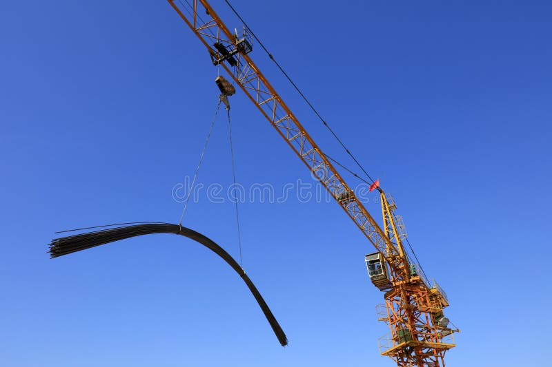 Hoisting steel bar royalty free stock photos