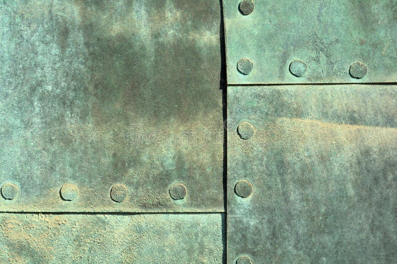 Close up of weathered copper sheet at a historic old door at the Cathedral of Magdeburg. Close up of weathered copper sheet at a historic old door at the Cathedral of Magdeburg