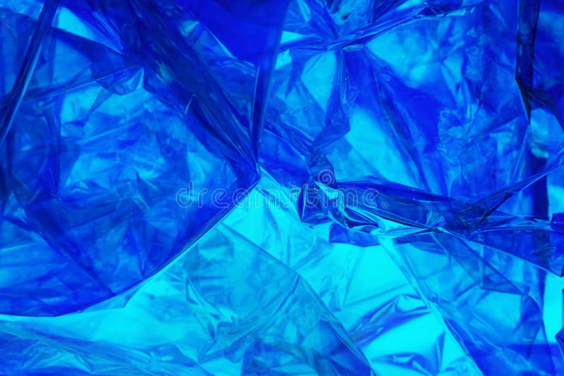 Hoja plástica en luz polarizada coloreada azul fotografía de archivo libre de regalías Hoja plástica en luz polarizada coloreada azul fotografía de archivo libre de regalías