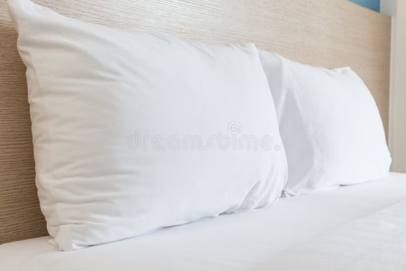 Close up white bedding sheets and pillow in hotel room. Close up white bedding sheets and pillow in hotel room