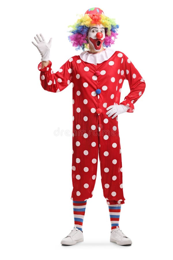 Full length portrait of a cheerful clown waving hello isolated on white background. Full length portrait of a cheerful clown waving hello isolated on white background