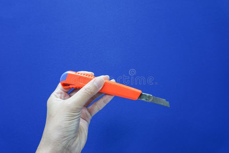 Orange Box Cutter stock photo. Image of tool, blade - 135936004