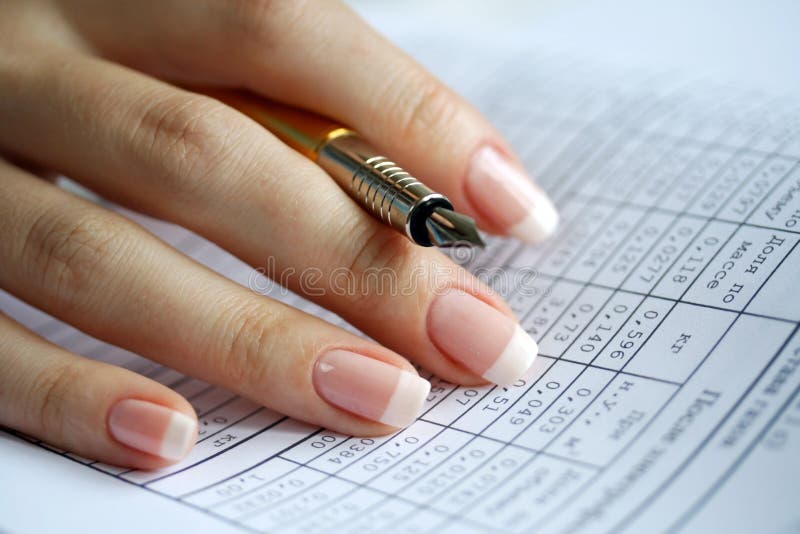 Holder in a female hand, table of data, statistics. Respectable number stock images, royalty-free photos and pictures