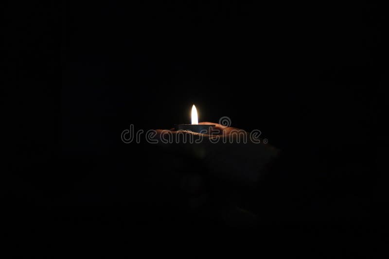 Holding burning candle stock image. Image of celebration 186672045