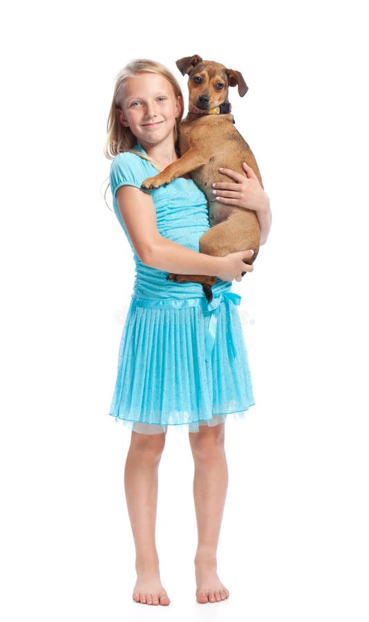 Holding della ragazza il suo cane fotografia stock Holding della ragazza il suo cane fotografia stock