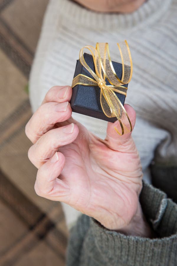 Holding a gift pack