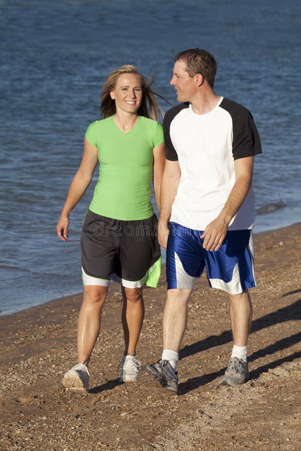 Holding hands beach