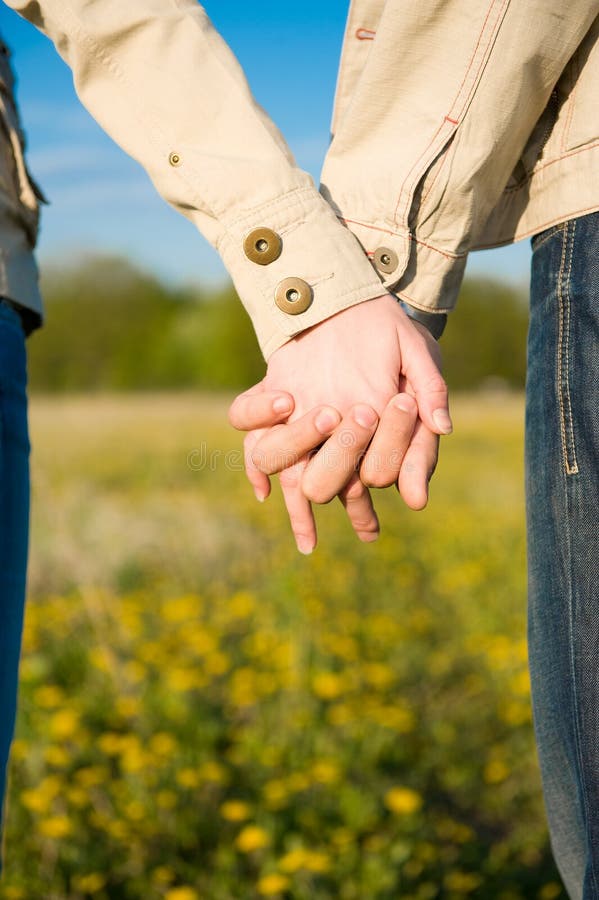 Holding hands on the field