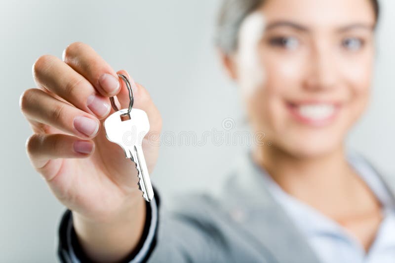 Holding key stock photo