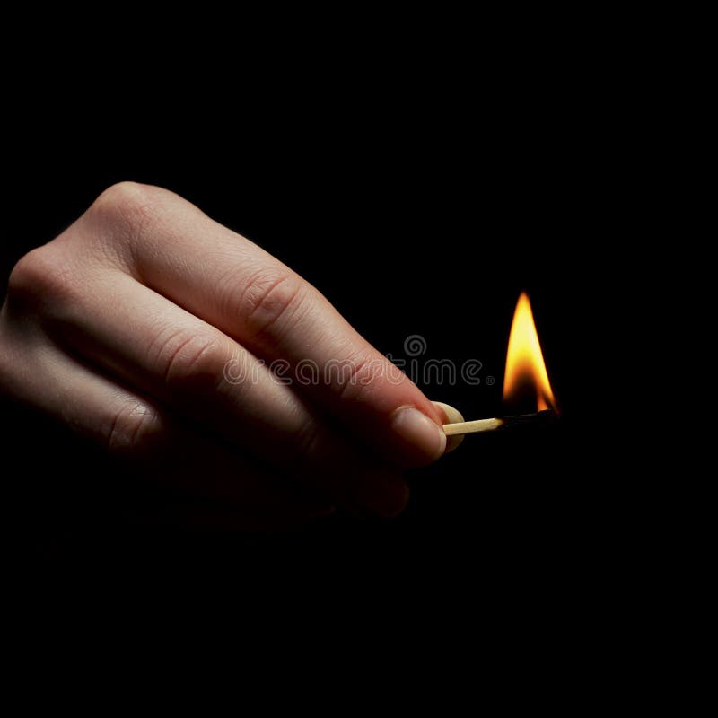 Holding a Lighted Match