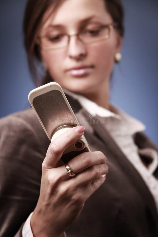 Holding phone stock image. Image of leadership, beautiful 12041367