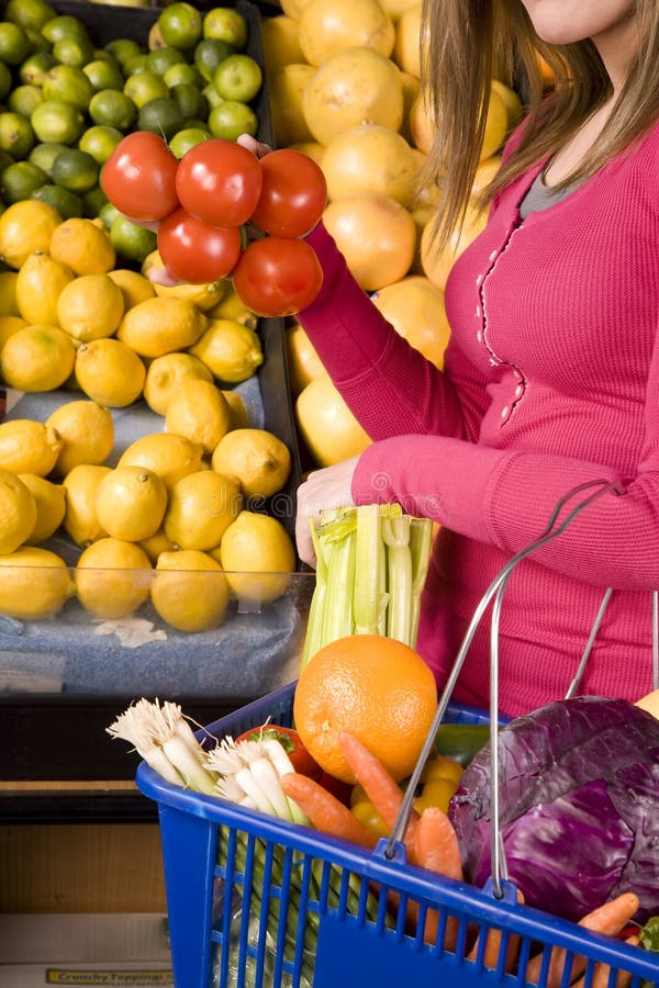 Holding tomatoes stock images