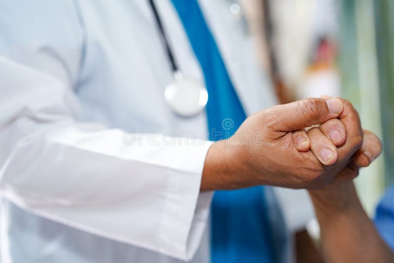 Holding Touching hands Asian senior or elderly old lady woman patient with love, care, helping, encourage and empathy at nursing h. Ospital ward : healthy strong royalty free stock photography Holding Touching hands Asian senior or elderly old lady woman patient with love, care, helping, encourage and empathy at nursing h. Ospital ward : healthy strong royalty free stock photography