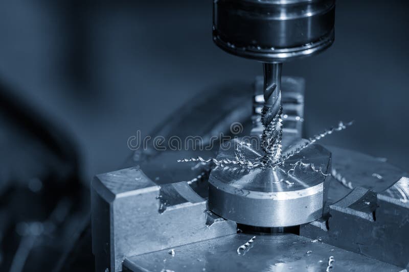 The hole chamfering process on NC milling machine with chamfer tools royalty free stock photos