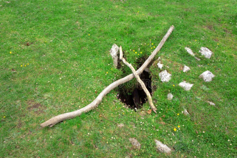 Big hole in grass stock photo. Image of hollow, deep, build 3948826