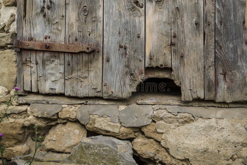 Hole in old barn door