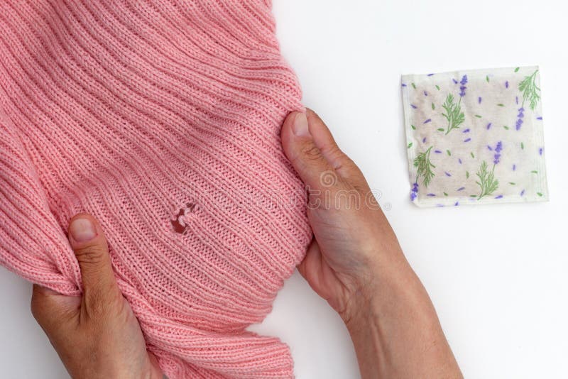 Lavender sachet in a woolen jacket pocket in a closet, moth repellent Stock  Photo - Alamy