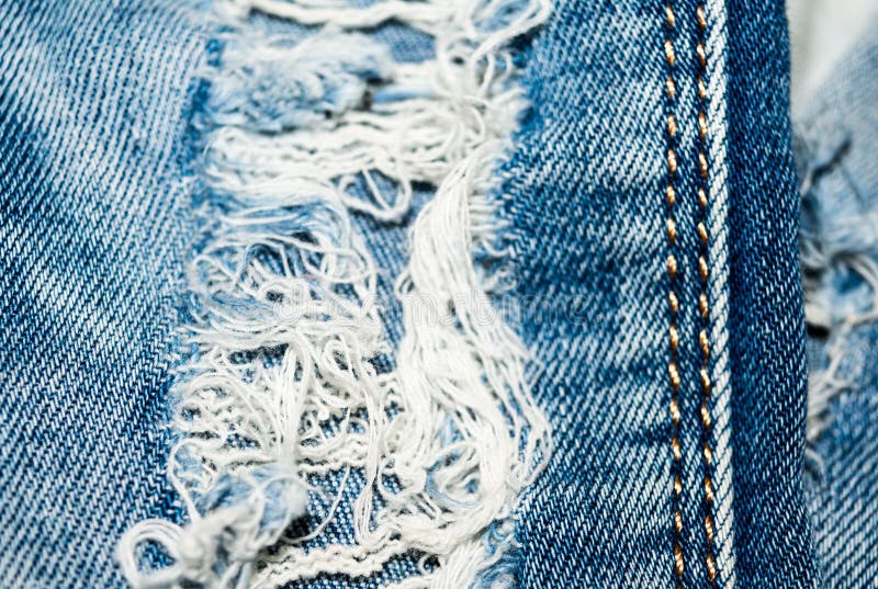 Holey Jeans. Blue Denim Texture. Threads, Seam Stock Image Image of