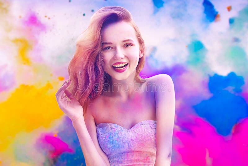Holi Festival Of Colours. Portrait of happy young pretty girl on holi color festival. Girl with colorful long pink and blue hair s stock photos Holi Festival Of Colours. Portrait of happy young pretty girl on holi color festival. Girl with colorful long pink and blue hair s stock photos