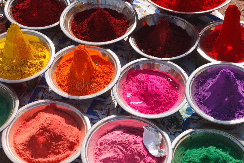 Holi color powder. Organic Gulal colours in bowl for Holi festival, Hindu  tradition festive. Bright vibrant pigment closeup Stock Photo by  ©gilmanshin 250440020