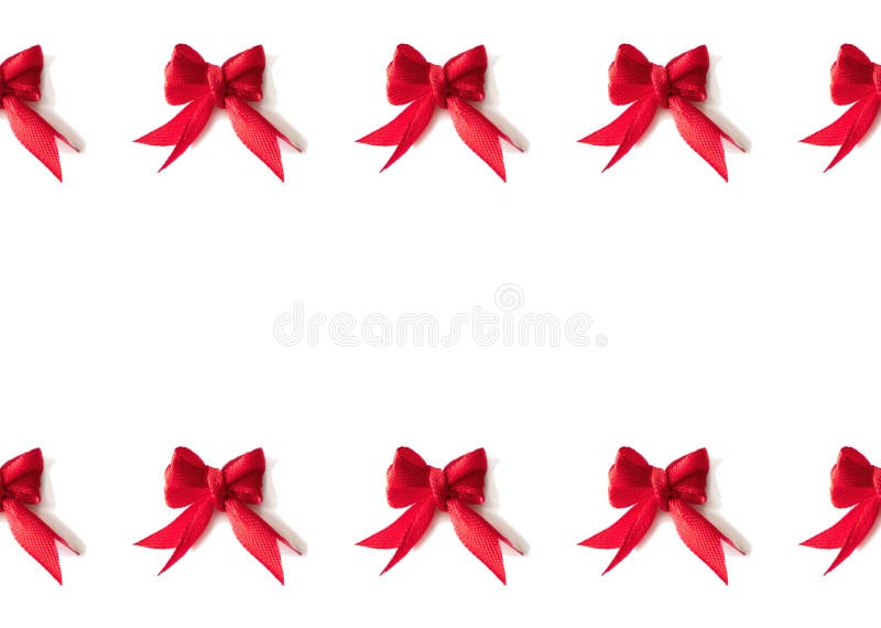 strips of red shiny ribbon and a bow over a white background with Clipping  Path, Stock image