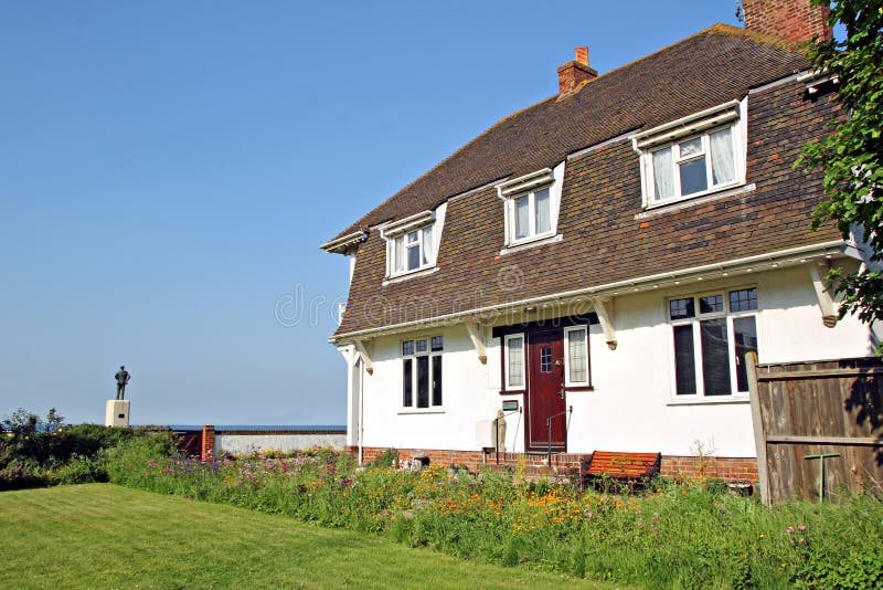 Holiday cottage by the sea stock image. Image of mansion 25018481