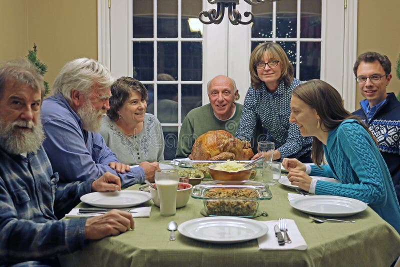 Holiday Dinner with family stock photo. Image of company - 48037176