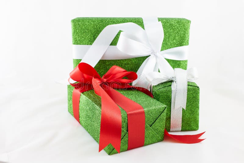 Holiday Gift Boxes Decorated with Ribbon on White Backg Stock Photo